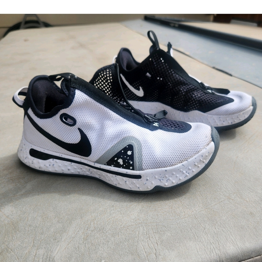 Nike Black and White Slip-On Sneakers